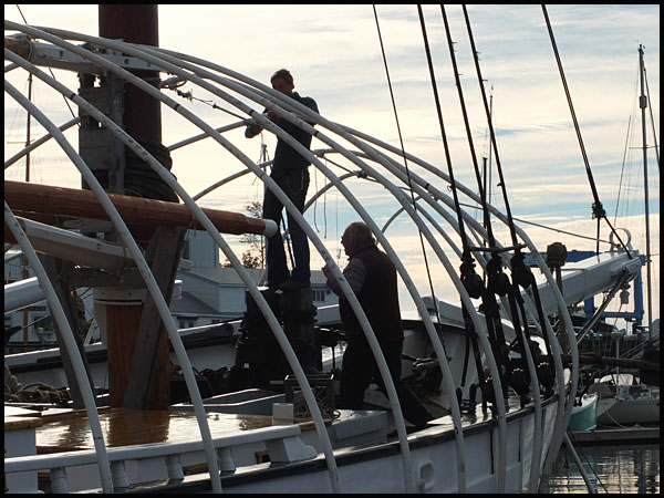 Ray Williamson (right) directs the placement of a stringer.