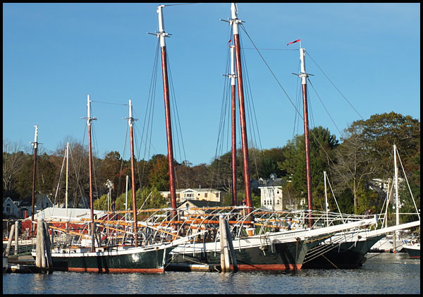 All three green boats are readied for plastic