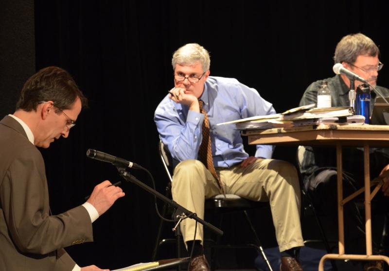 Pierce Atwood Attorney argues before the Camden Planning Board why an ordinance amendment favoring Fox Hill rehab center should not be recommended to the Camden Select Board. Camden Attorney Bill Kelly, on stage, listens. To his left, Camden Planner and Code Enforcement Officer Steve Wilson. (Photo by Lynda Clancy)