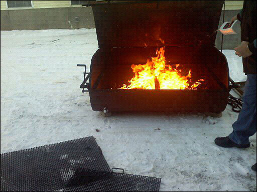 The cooker for the turkeys is lit behind Thompson Community Center in Union. (Courtesy Bill Packard)