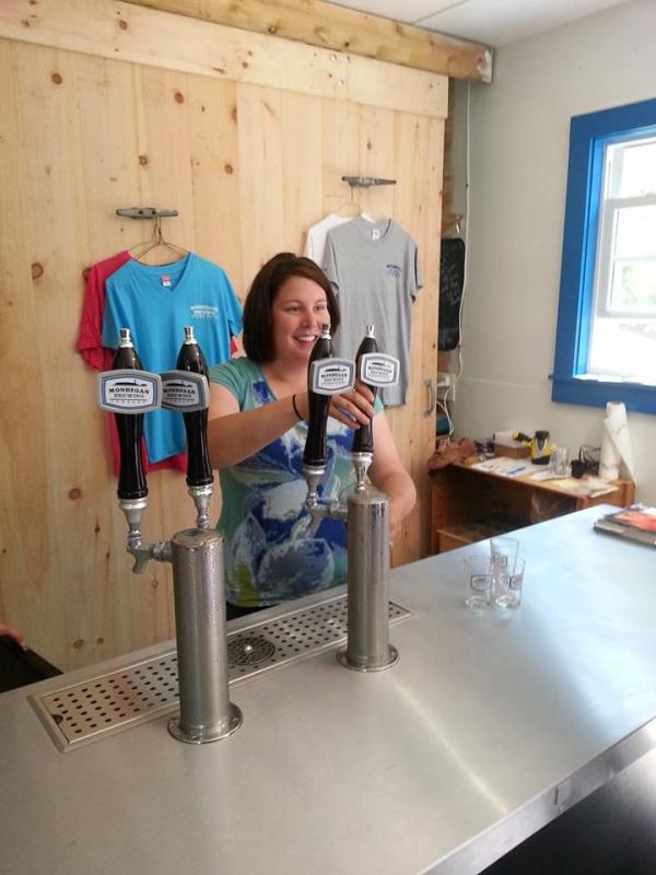 Summers when Mary Weber’s not teaching, she’s pouring. (Courtesy Monhegan Brewing Company)