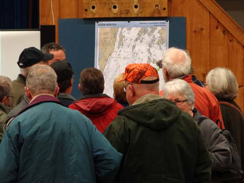 At the close of the Nov. 14 meeting, citizens of the Bristol area took a closer look at the University of Maine’s plans for a two-turbine study of a new floating platform design. (Shlomit Auciello photo) Bristol area took a closer look at the University of Maine floating wind turbine platform