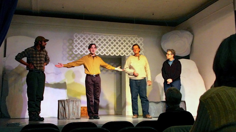 Jacob Fricke, second from left, with the poets who read their work on Nov. 22. From left, Josh Kauppila, Fricke, Doug Brown and Laurence Coe. (Photo by Wes Sterrs)