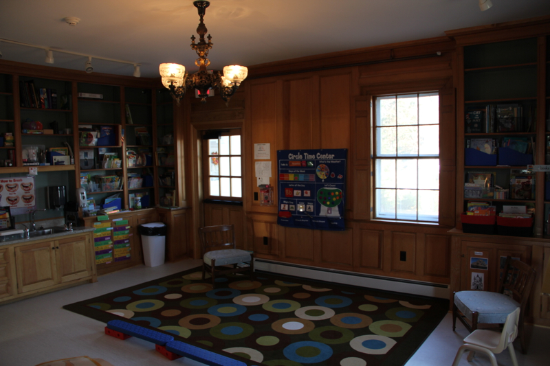 Though many renovations have been made, most of the classrooms still have the original 200-year-old chandeliers. (Photo by Wes Sterrs)