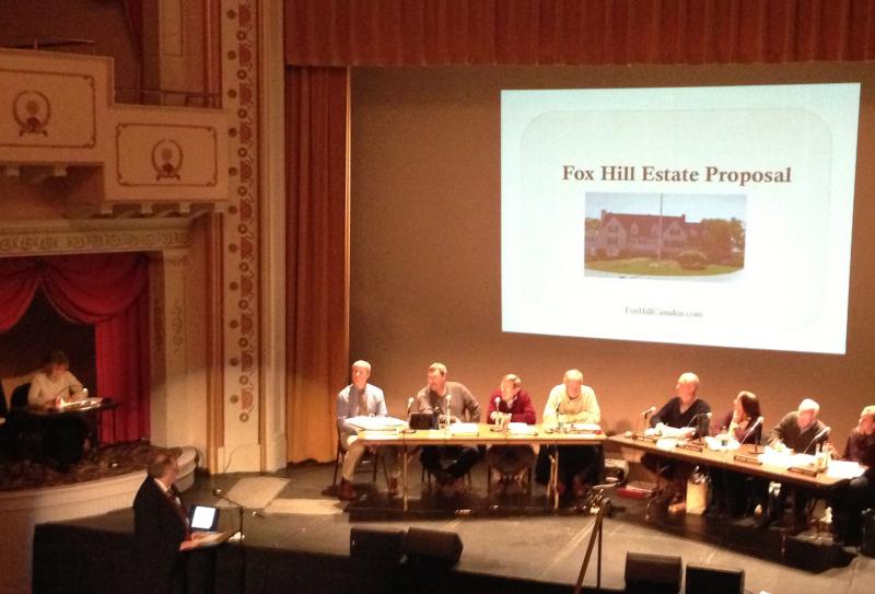 Camden Attorney Paul Gibbons sets off as the first of many speakers before the Camden Planning Board, Nov. 20. The public hearing took place at the Camden Opera House, with approximately 125 citizens, lawyers and consultants in attendance. (Photo by Lynda Clancy)