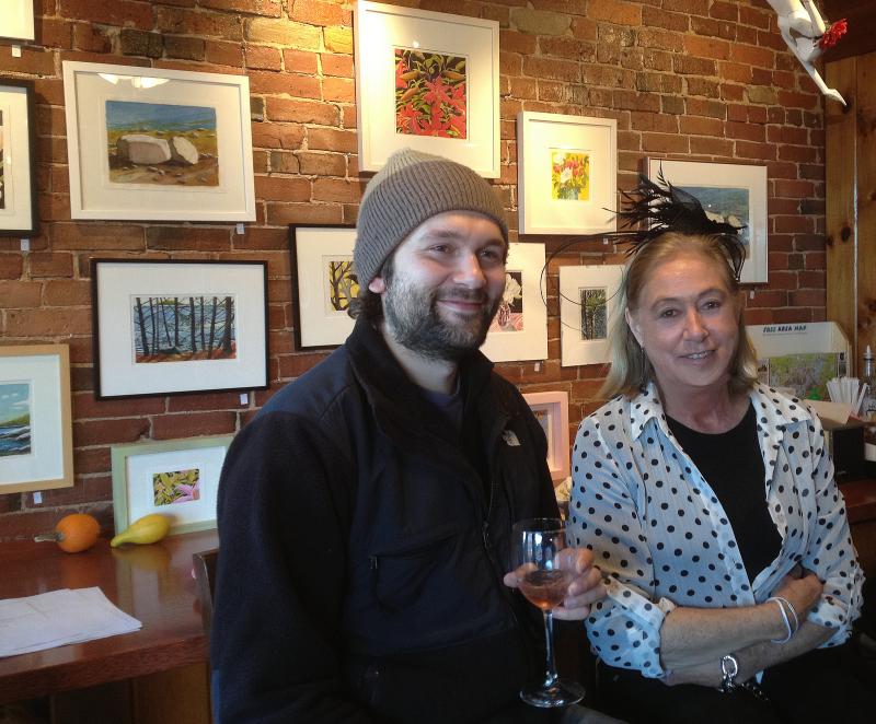 Suzi Thayer and fellow Boothbay Register writer/artist Ben Bulkeley at Red Cup Coffeehouse at the opening reception for her show, “Suzi Thayer Paintings,” featuring 18 watercolors. Wait! Make that 17 – one was sold at the November 23 event. SUE MELLO/Boothbay Register