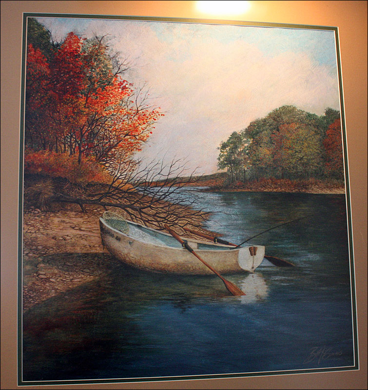 ‘I started painting in 1989 after I decided I wanted something for my wall,’ said Ben McGinnis. This is his first watercolor, and the little boat still sits in his yard, today covered in snow and a layer of ice. (Photo by Holly S. Edwards)