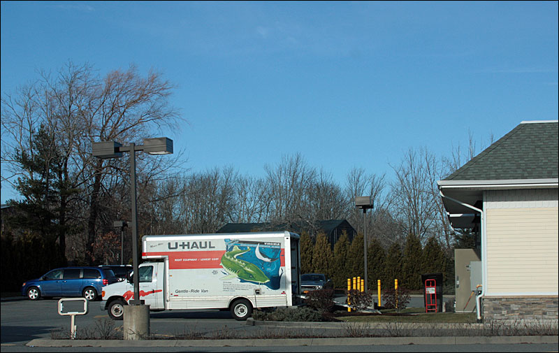 A rented moving truck sits at the back door of the closed Tim Horton’s Wednesday afternoon. (Photo by Holly S. Edwards)