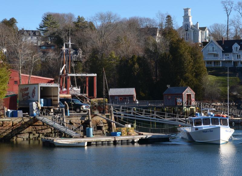 Most of Rockport’s commercial activity takes place at the northerly corner of the harbor. (Photo by Lynda Clancy) lobster boats Rockport Harbor Maine