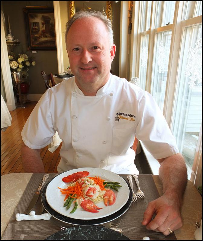 Chef Michael Salmon with his dish. (Photo by Chris Wolf)