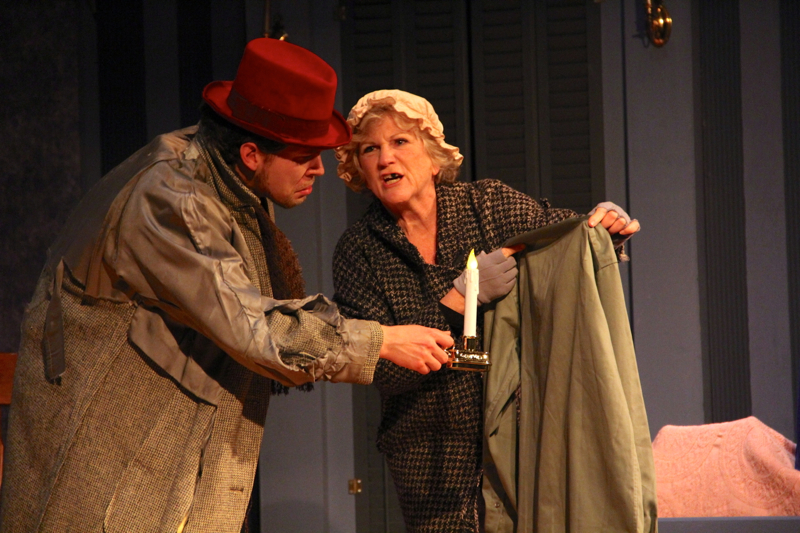 Scott Anthony Smith (left) and Christine West sport costumes designed by Elaine Bielenberg, wife of John. John Bielenberg also donated the set. (Photo by Wes Sterrs)