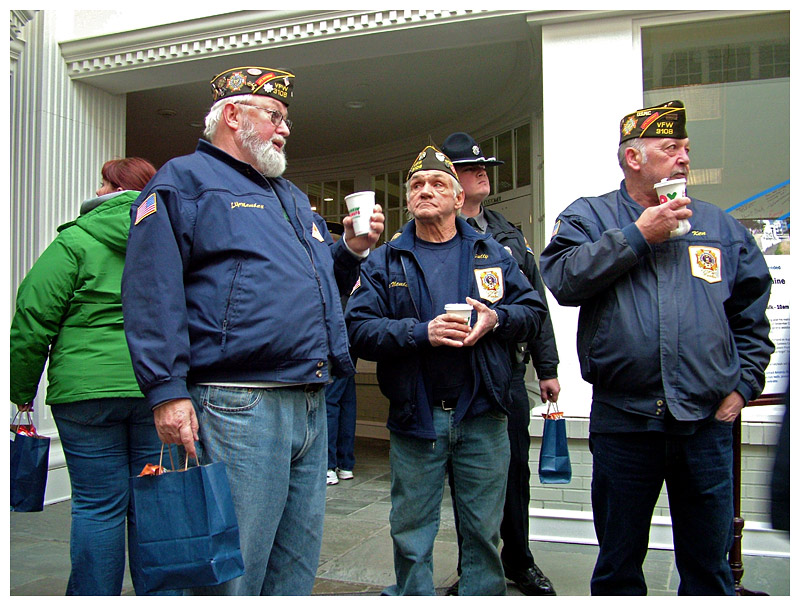 Members of the Belfast-based VFW Post 3108 were among scores of veterans on hand to greet the wreath-bearing trucks, Sunday. (Photo by Ethan Andrews)