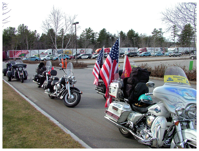 Outside Bank of America in Belfast, motorcycles, tractor trailers and scores of other vehicles traveling with Wreaths Across America. (Photo by Ethan Andrews)