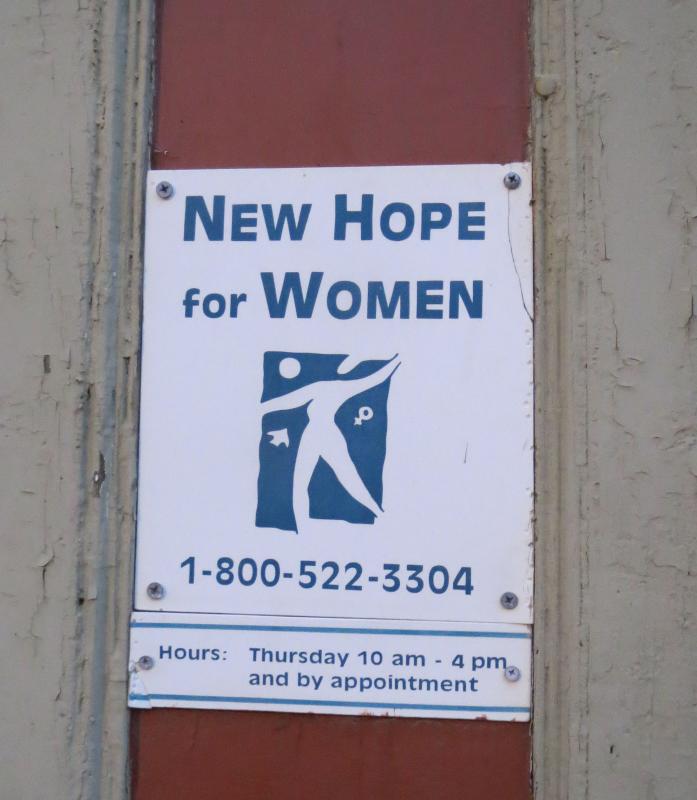 The sign for New Hope’s Belfast office, located directly across the street from the Belfast Police station.