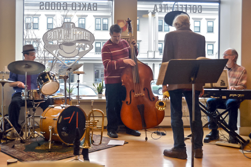 The Mike Whitehead Group, with Whitehead (back to), Jason Dean on drums, Spike Hyssong on bass and Steve Lindsay on keyboard, gets the show rolling a little before 1 p.m. (Photo by Ron Hawkes)