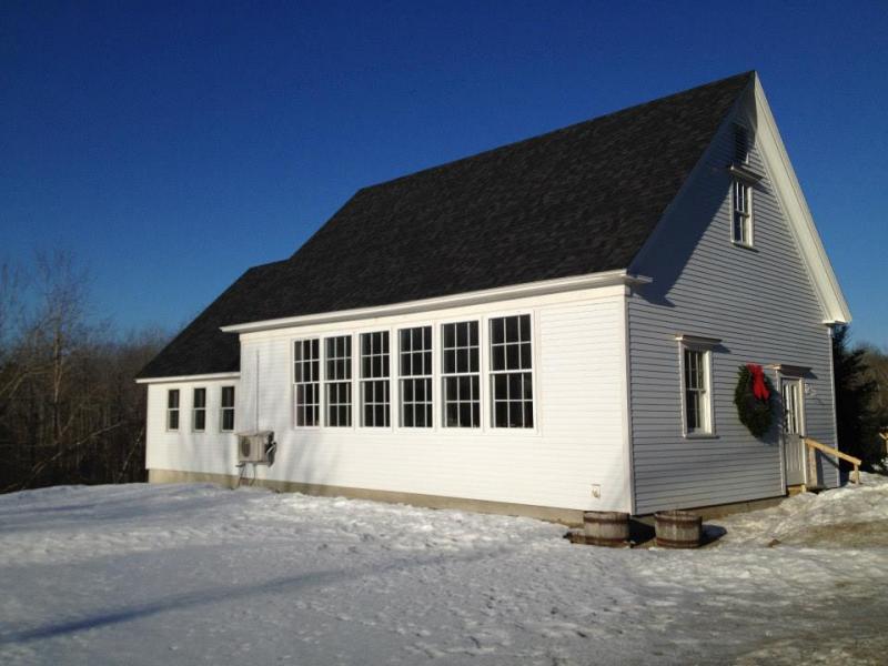 The Lincolnville Community Library’s exterior is now finished with brand new donated storm windows. (Courtesy Lincolnville Community Library)