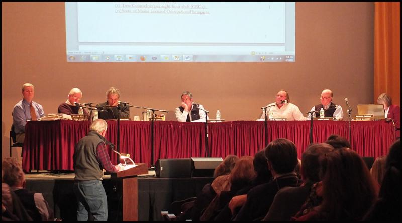 The Camden Select Board listens to more than two hours of citizen testimony at the Feb. 4 public hearing before reading individual prepared statements. (Photo by Chris Wolf)