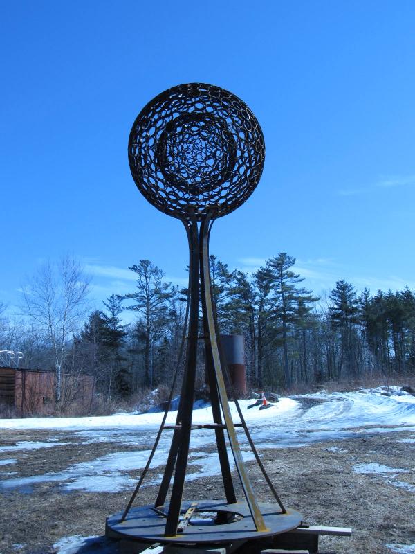 The sculpture sits on a flat bar steel stand also constructed by Sawyer, which stands at nearly 10 feet. (Photo by Kay Stephens)