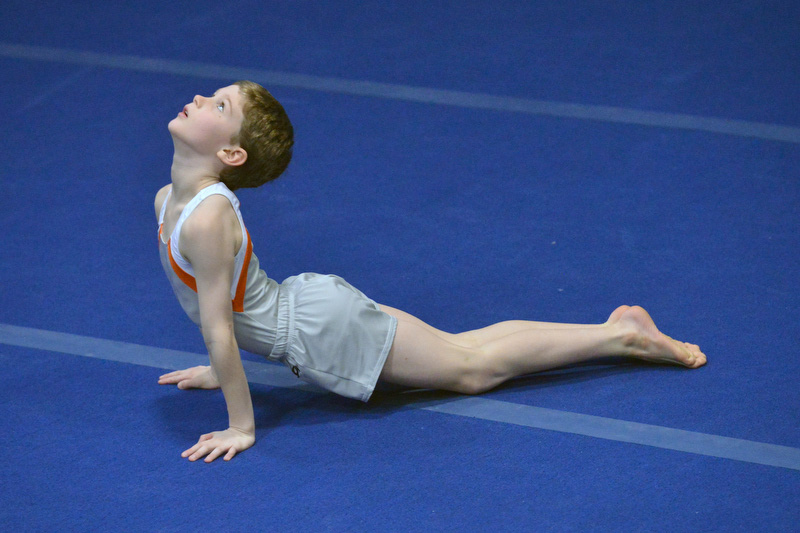 NAGA’s Ben Schenk performed a beautiful floor exercise. (Photo by Ron Hawkes)