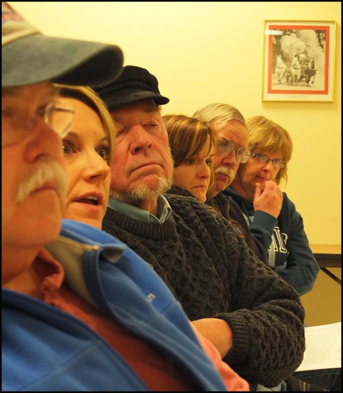 The front row Thursday night. All with questions for the DA.