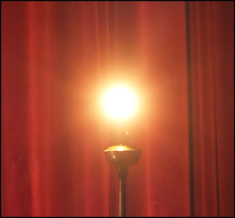 The ghost light. Hint: Whenever it's on, the ghost is about to speak.