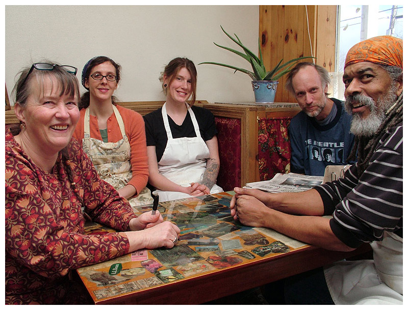 Some of the staff members of the recently reopened Monroe General Store squeeze into a corner booth of the new Wicked Rooster Café. From left, Kelly Davis, April Thibodeau, Becca Biggs, owner Rob Lindholm and Bill Davis. (Photo by Ethan Andrews)