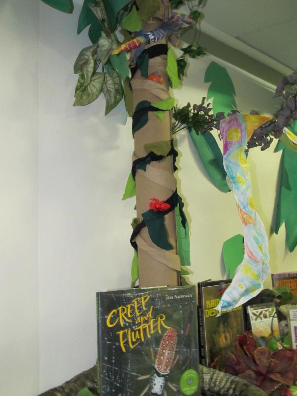 All the palm trees were decorated by volunteers; the ‘trunks’ of cardboard were donated by Cayouette Flooring. (Photo by Kay Stephens)