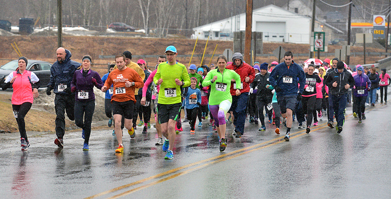 Rain, wind and 35 degrees — but these brave folks turned out to run and walk the Third annual TaTa Trot 5K in Belfast March 30. (Photo by Ron Hawkes)