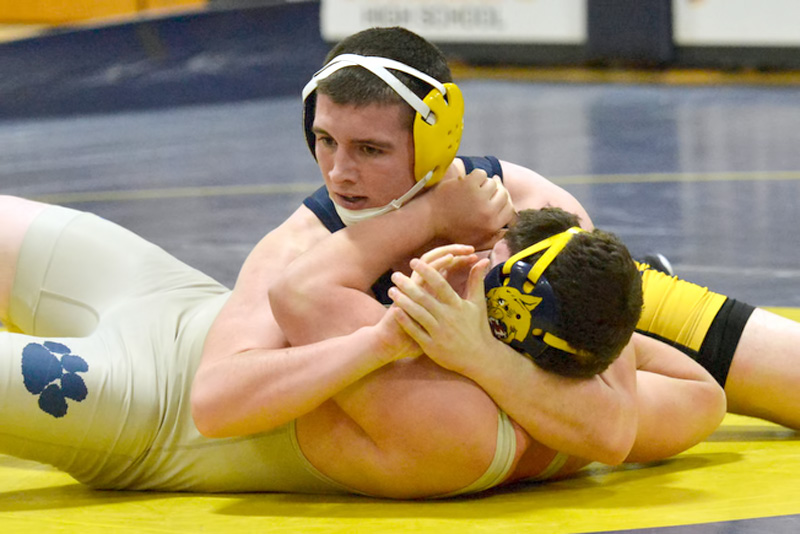 Cyril Miller broke Medomak Valley High School’s career wins total with this pin against a Mount Blue wrestler last weekend. (Photo by Ron Hawkes)