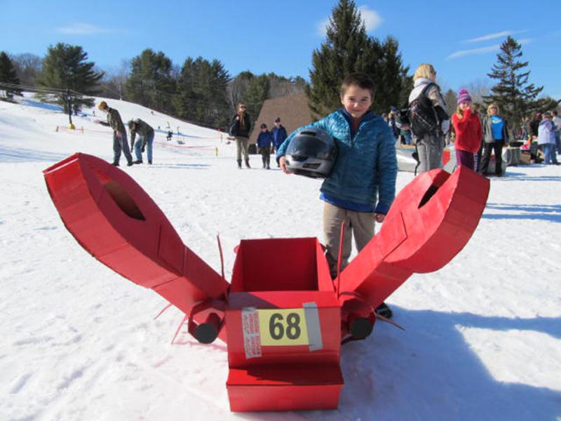 Dante Jacob, 10, captain of his cardboard racer, Lobster Boggin, won Most Creative Box. (Photo by Kay Stephens)