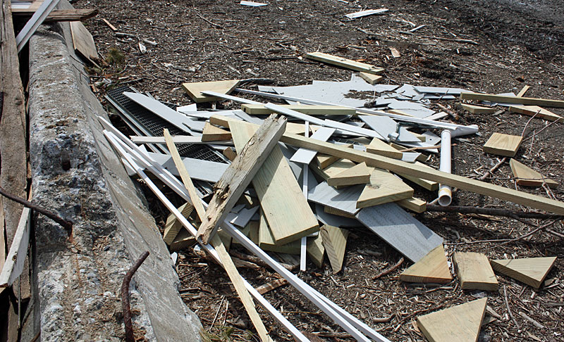 Mid-Coast Solid Waste Corp. manager Jim Guerra has started a secondary pile of non-demolition wood that people have put into the pile, and it contained a variety of disqualified components. (Photo by Holly S. Edwards)