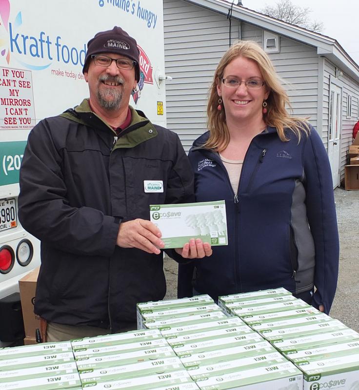 A representative from Efficiency Maine and Tia Harris of the Good Shepherd Food Bank. (Photo by Chris Wolf)