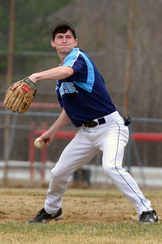 Oceanside’s Caleb Jacobs tries to recover from an error as he fires the ball across the diamond. (Photo by Ron Hawkes)