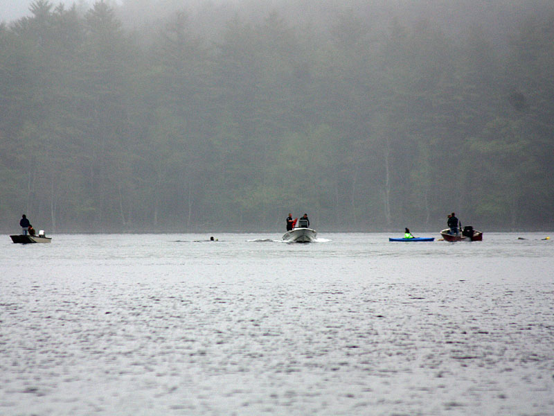First responders and good Samaritans search Megunticook Lake in Camden Tuesday morning for a missing sculling boat rower. (Photo by Holly S. Edwards)