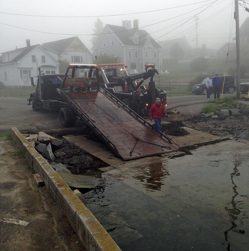 Automaster Collision Center of Spruce Head was called to pull Justin Libby’s pickup truck out of the harbor, off the boat launch, in Port Clyde. (Courtesy Chris Chadwick)