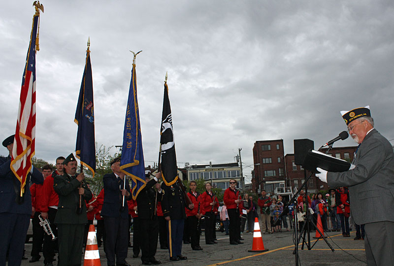 Camden American Legion Post Adjutant Ray Lewis opens the Memorial Day service at the public landing Monday morning. (Photo by Holly S. Edwards)