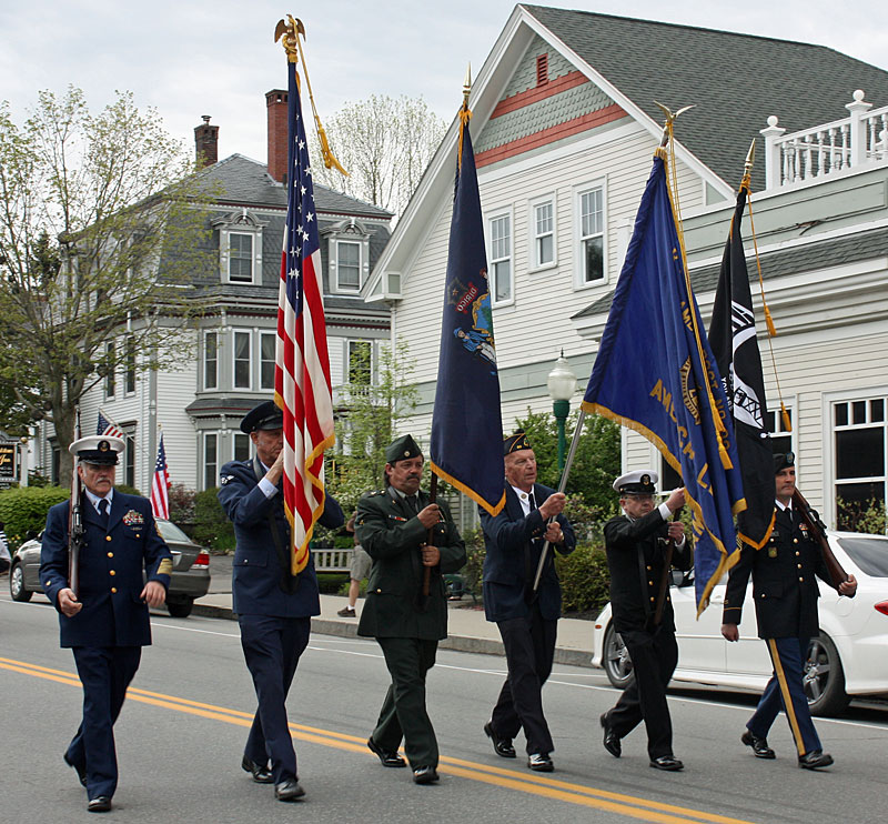 The color guard leads the parade into downtown Camden Monday morning. (Photo by Holly S. Edwards)