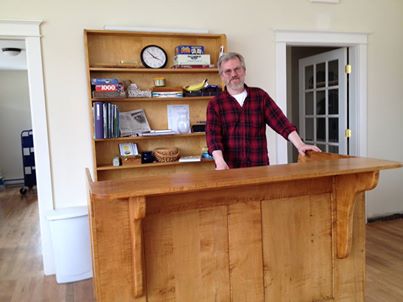 Michael Timchak and Windsor Chairmakers of Lincolnville gifted this handcrafted circulation desk for the Lincolnville Community Library. (Photo courtesy Lincolnville Community Library)