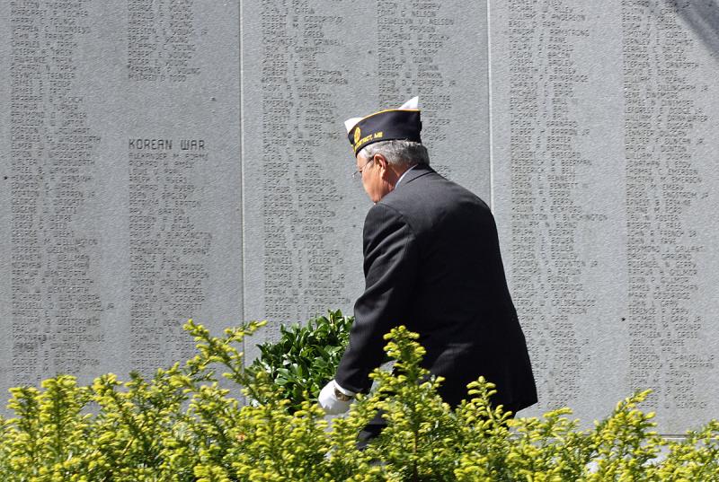 The annual Memorial Day parade in Camden begins at 9:30 a.m. and travels down Route 1, beginning at Camden Street. One of the stops is at the Village Green, where a wreath is placed on the Honor Roll and taps are played. (Photo by Holly S. Edwards)