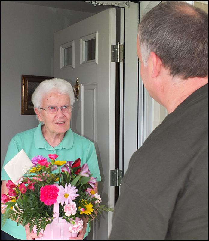 Chief Farley delivers flowers to Allison Montgomery.