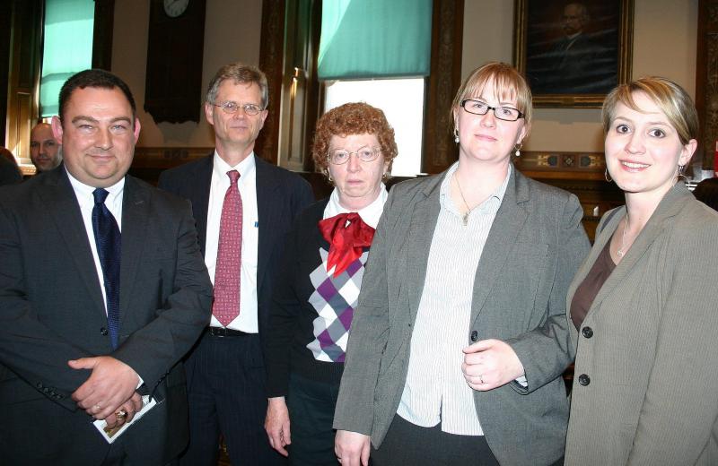 Left to right: The newly sworn Judge Walker, District Attorney Geoffery Rushlau, Assistant District Attorney Patricia Mador, Victim/Witness Advocate Katie Butler and Assistant District Attorney Lindsay Jones. (photo by Erica Thoms)