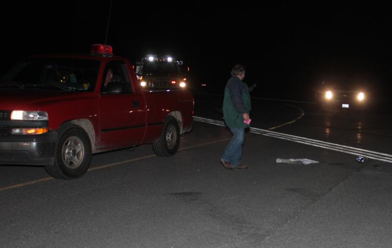 Airport manager Jeff Northgraves at the location where the plane, taking off at speeds of 70 mph, crashed into the pickup truck crossing the runway. (Photo by Holly S. Edwards)