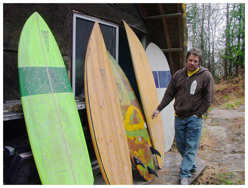 Josh Moody outside of his surfboard workshop, located next to his home in Monroe. (Photo by Ethan Andrews)