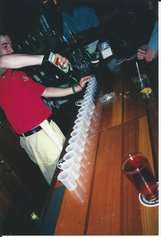 Bartender Aarom Crossman in Camdeb’s Seadog Brewery pours a row of Jager shots in 2001. (Photo courtesy Carolyn McLean)