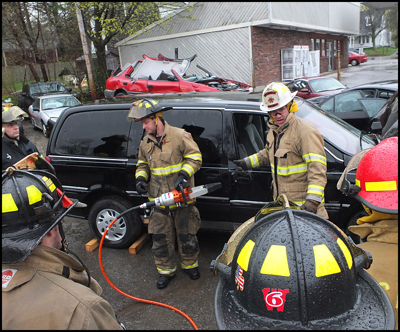 Lowe gives some basics before trainees start using extrication equipment on a van.