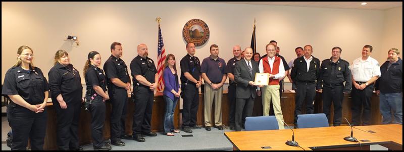 Chief Jordan with members of the City Council and members of Rockland's fire and EMS service.