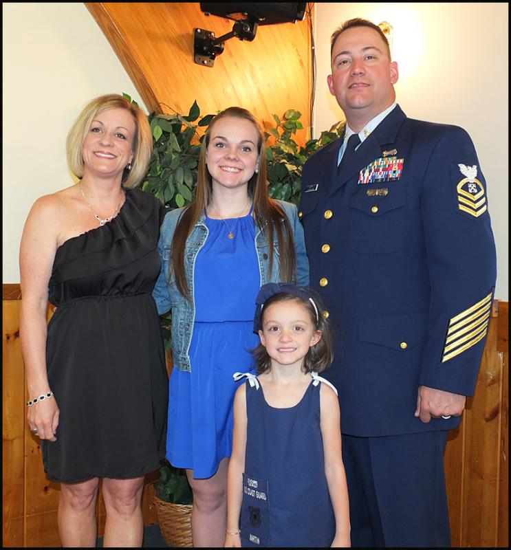From left, Crystal Martin, Hailey Hobbs, Chief Ed Martin and Taylor Martin, in front.