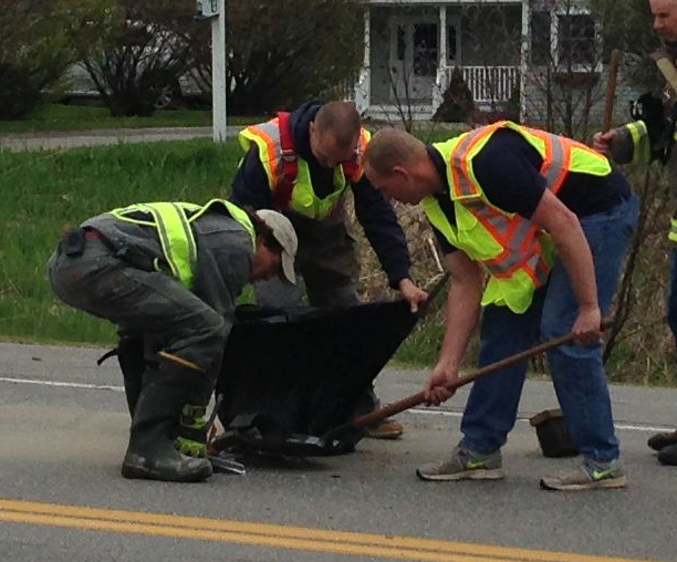 Firefighters with Rockport Fire Department cleaned the debris from the highway. (Photo by Lynda Clancy)