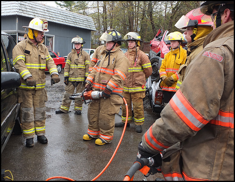 CFD Assistant Chief Andrew Lowe (left) instructs students.