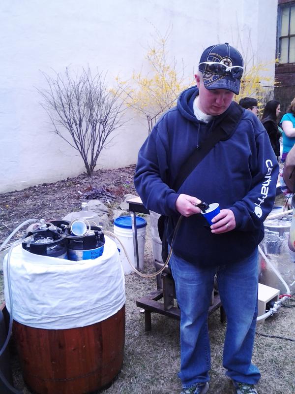 About a half dozen homebrewers were on hand to teach the public how it’s done, and of course, sample the end product. Photo by Kay Stephens